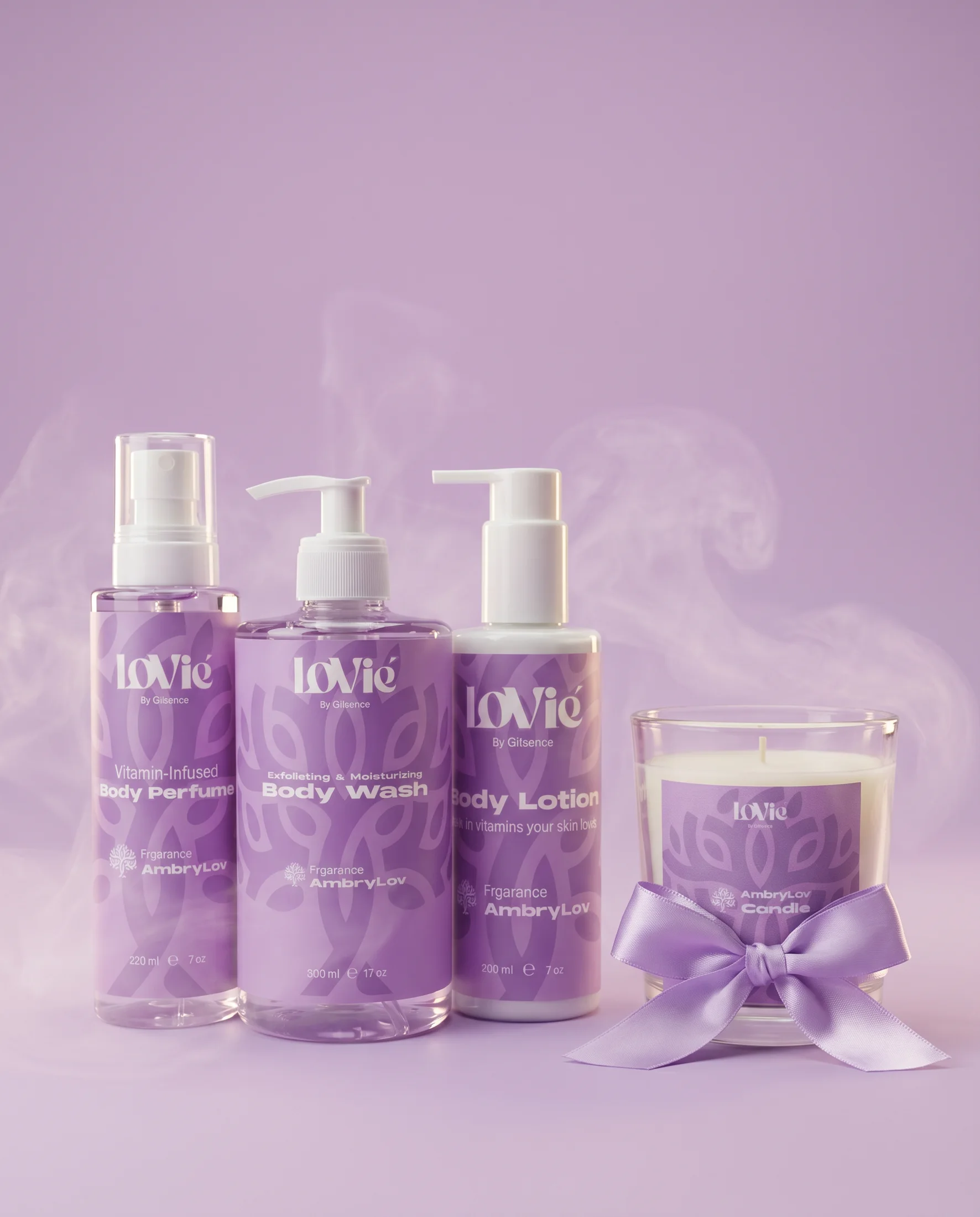 The violet AmbryLov gift set: wash, lotion, perfume and a ribboned candle in steam on a lilac ground.