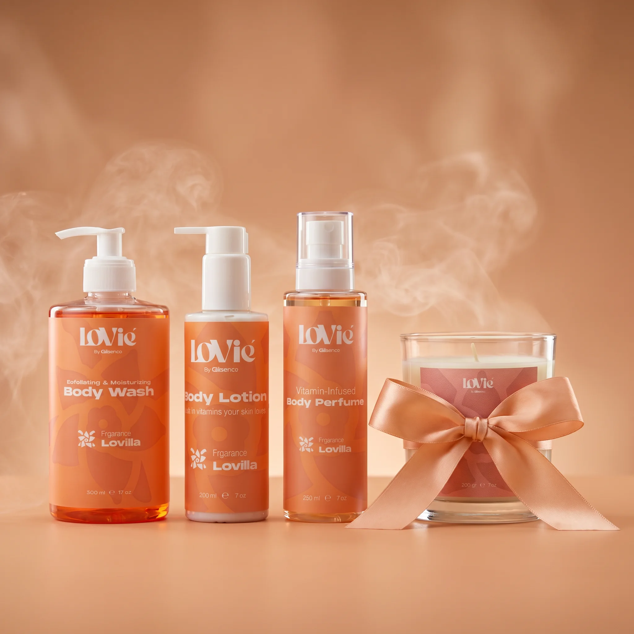 The orange Lovilla gift set: body wash, lotion, perfume and a ribboned candle standing in steam on a warm ground.