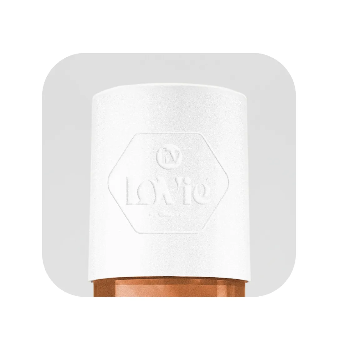 White bottle cap embossed with the Lovie monogram badge.